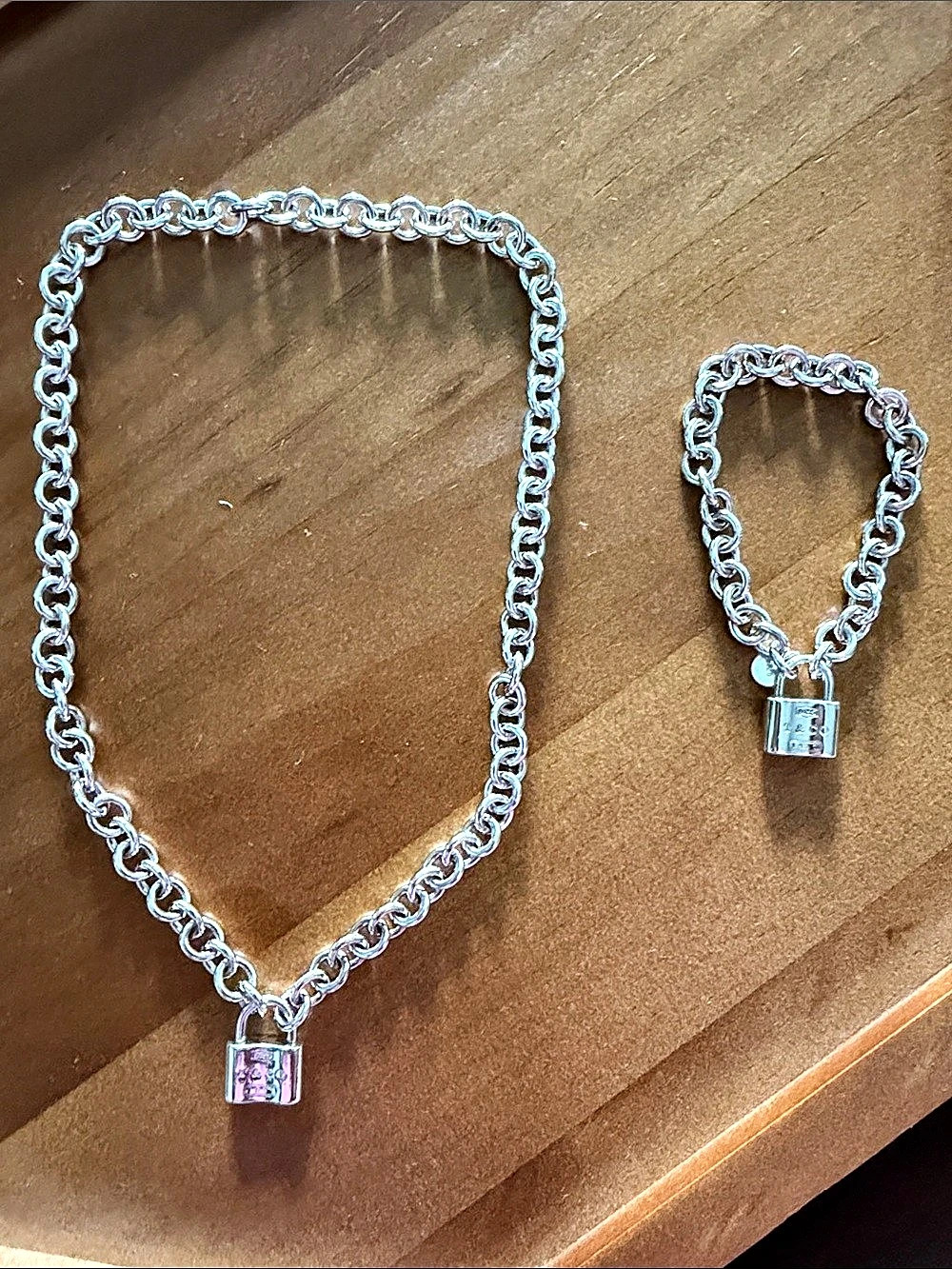 Tiffany & Co. Tiffany 1837 Padlock Charm Bracelet and Necklace Set. Tiffany 1837